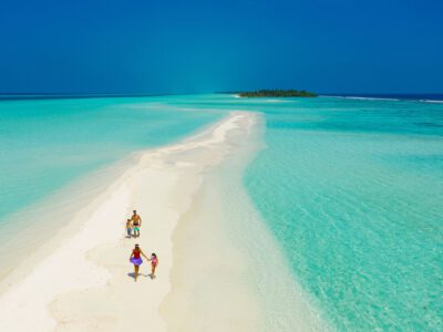 Kandima people beach with family