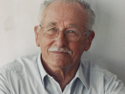 orträt von Walter Baumgardt, einem älteren Mann mit Brille und Schnurrbart, der von den Folgen eines Schlaganfalls betroffen ist.