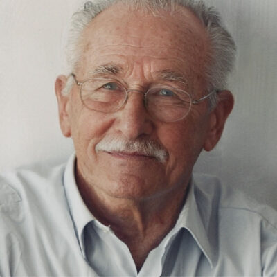 orträt von Walter Baumgardt, einem älteren Mann mit Brille und Schnurrbart, der von den Folgen eines Schlaganfalls betroffen ist.